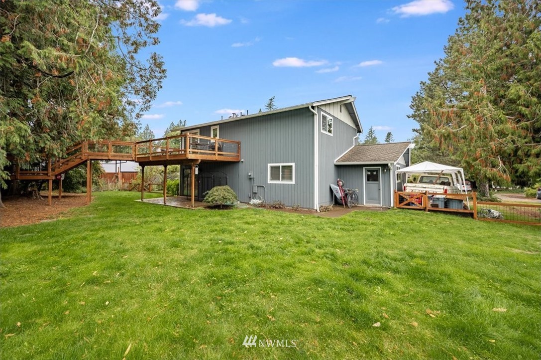 5942 Longdin Road Ferndale, WA 98248 - Photo 22 of 30 a front view of a house with garden