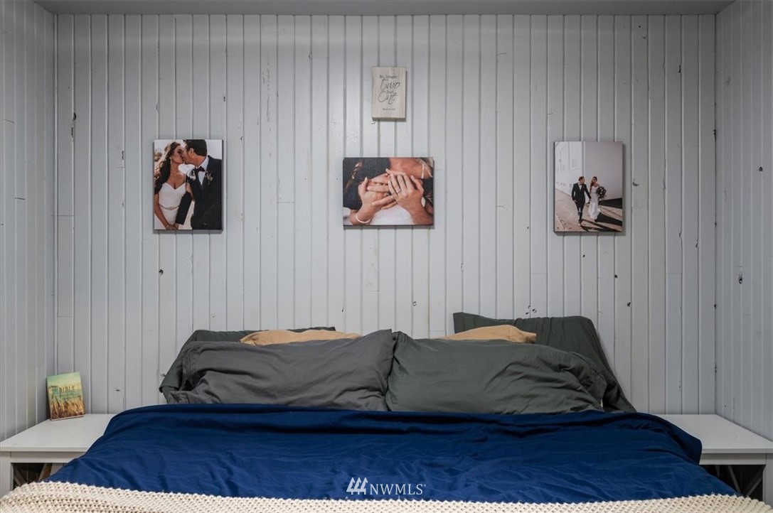 5942 Longdin Road Ferndale, WA 98248 - Photo 23 of 30 a bedroom with a bed and a couch