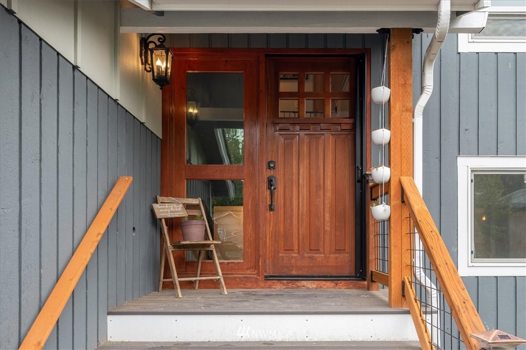 5942 Longdin Road Ferndale, WA 98248 - Photo 24 of 30 a view of a hallway with wooden floor and staircase