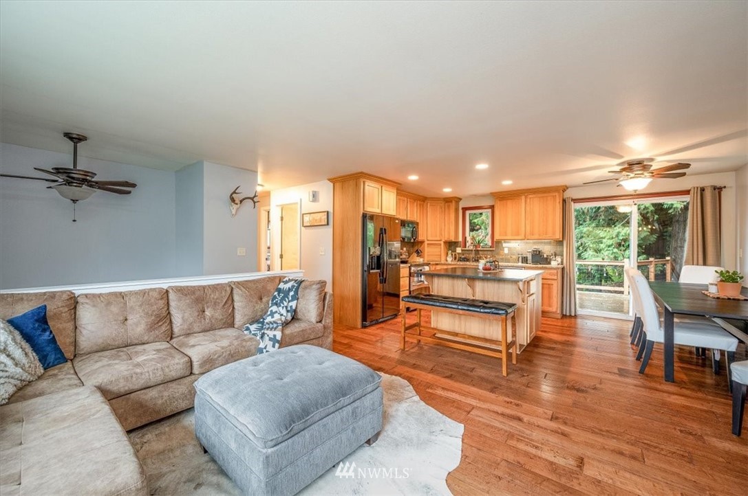 5942 Longdin Road Ferndale, WA 98248 - Photo 7 of 30 a living room with furniture and a view of kitchen