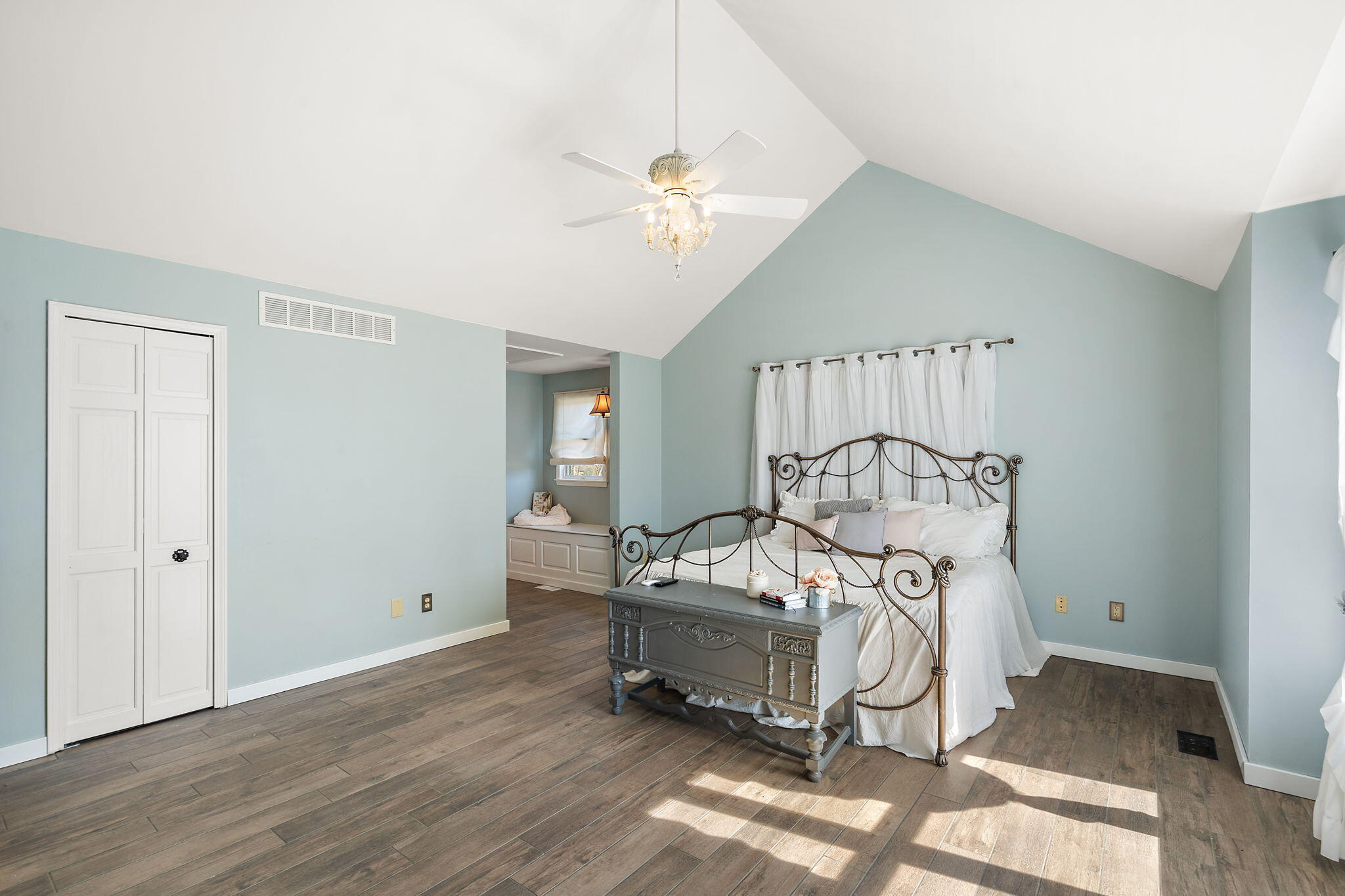 1790 West 134th Court Crown Point, IN 46307 - Photo 22 of 53 a bedroom with a bed and a chandelier