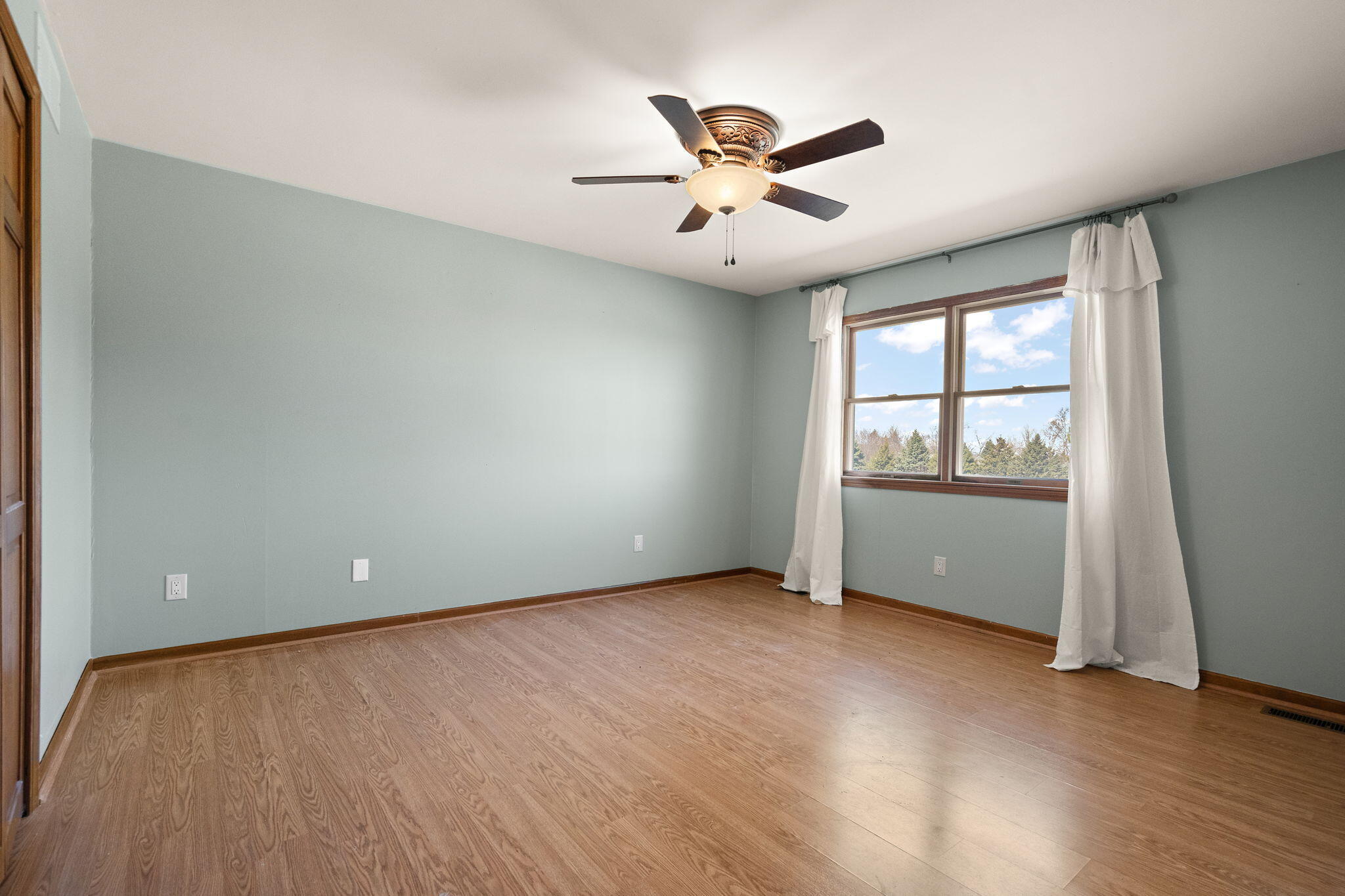 1790 West 134th Court Crown Point, IN 46307 - Photo 33 of 53 an empty room with windows and fan