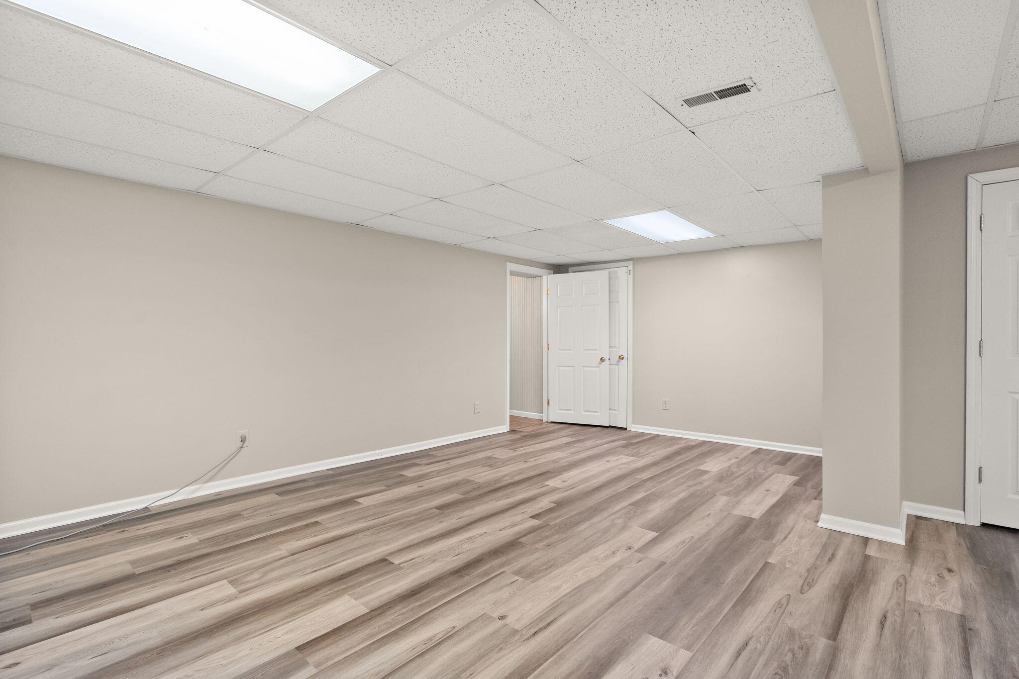 1790 West 134th Court Crown Point, IN 46307 - Photo 41 of 53 a view of an empty room with wooden floor