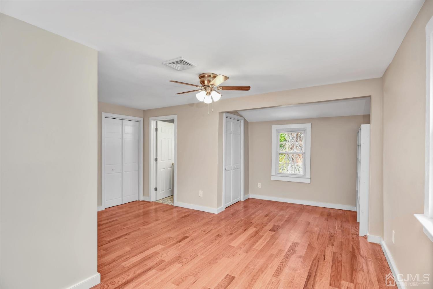 588 Adelphia Road Freehold, NJ 07728 - Photo 23 of 67 a view of a room with a ceiling fan and window