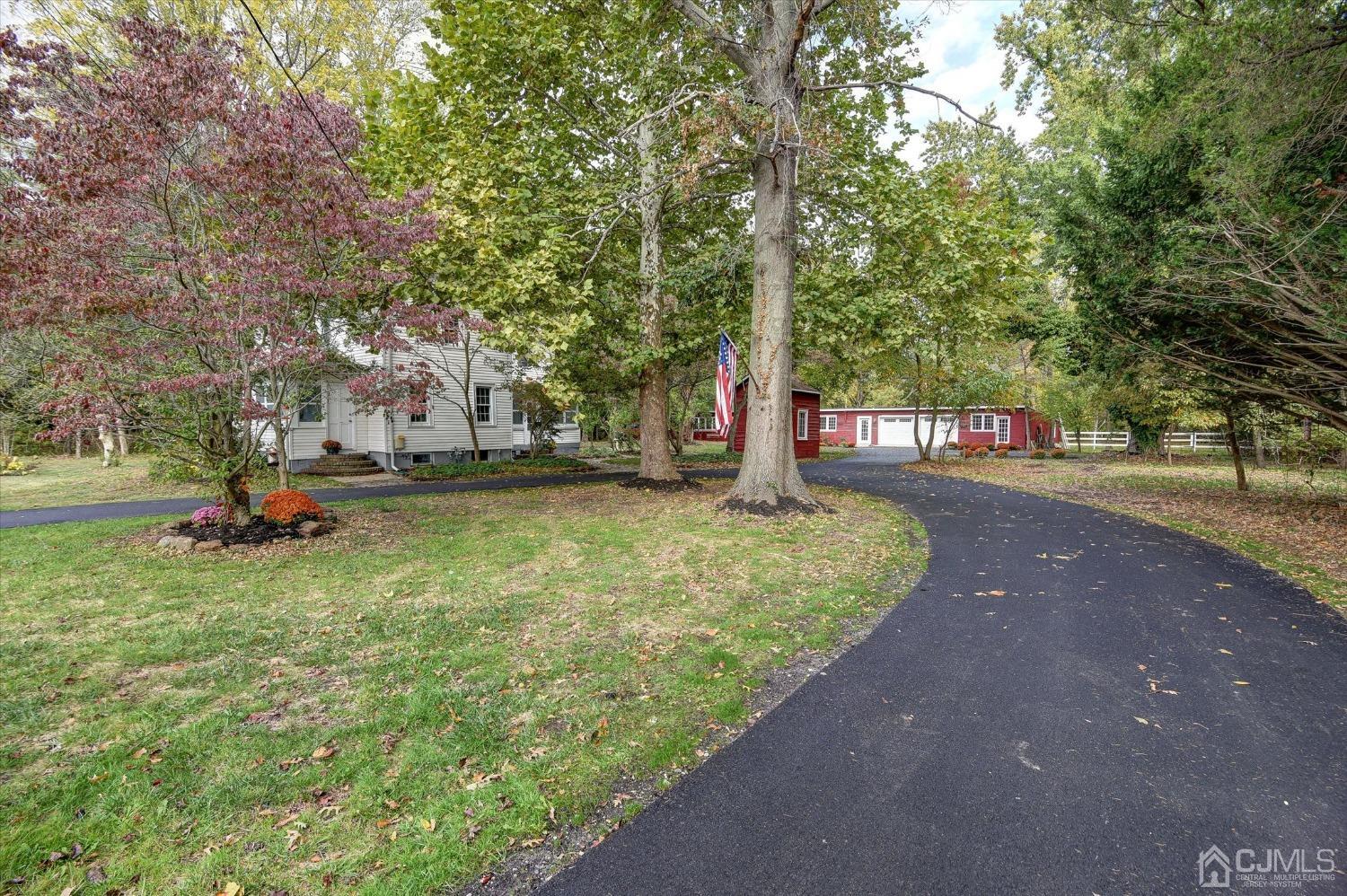 588 Adelphia Road Freehold, NJ 07728 - Photo 31 of 67 a view of a park with large trees