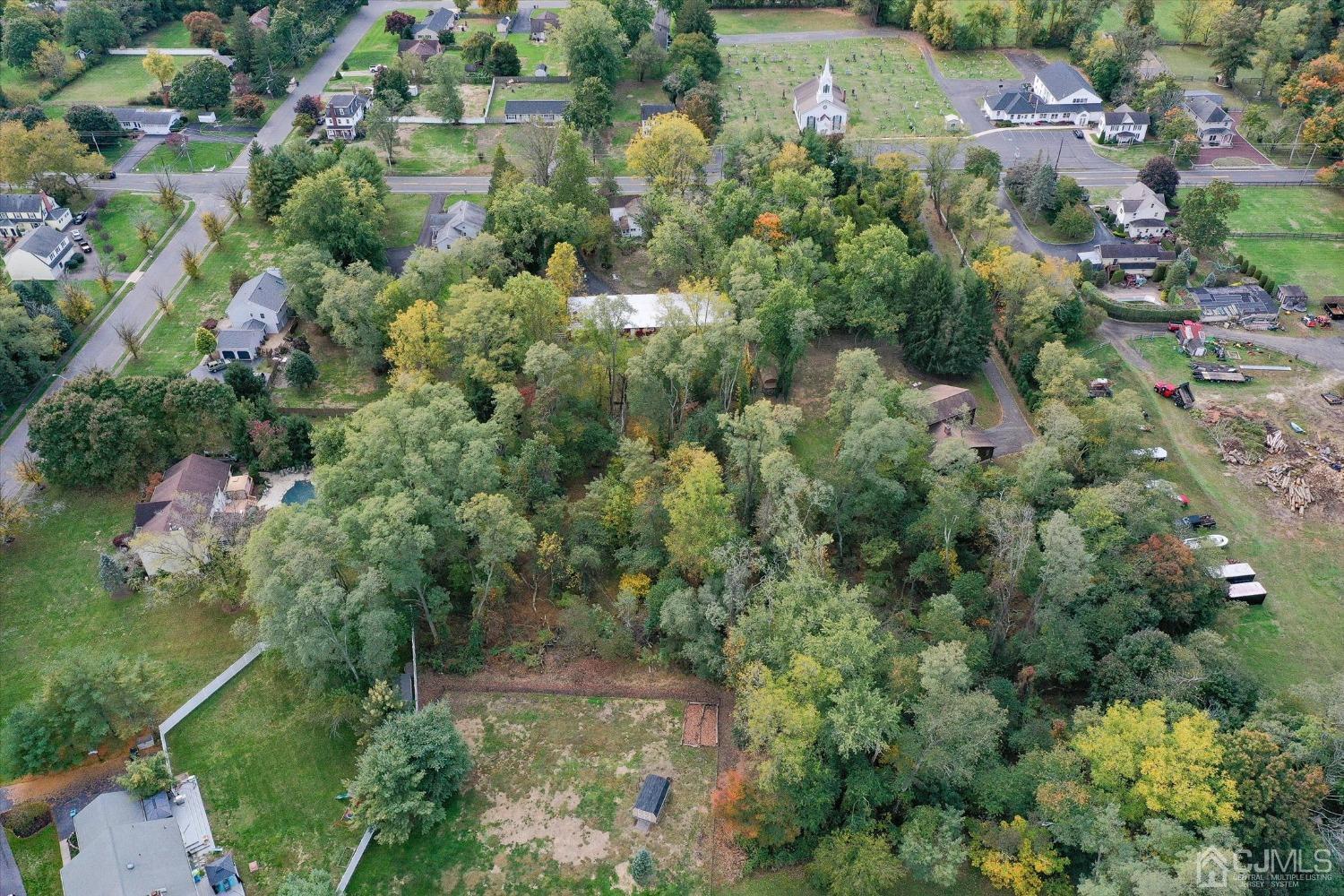588 Adelphia Road Freehold, NJ 07728 - Photo 60 of 67 an aerial view of residential house with outdoor space and trees all around
