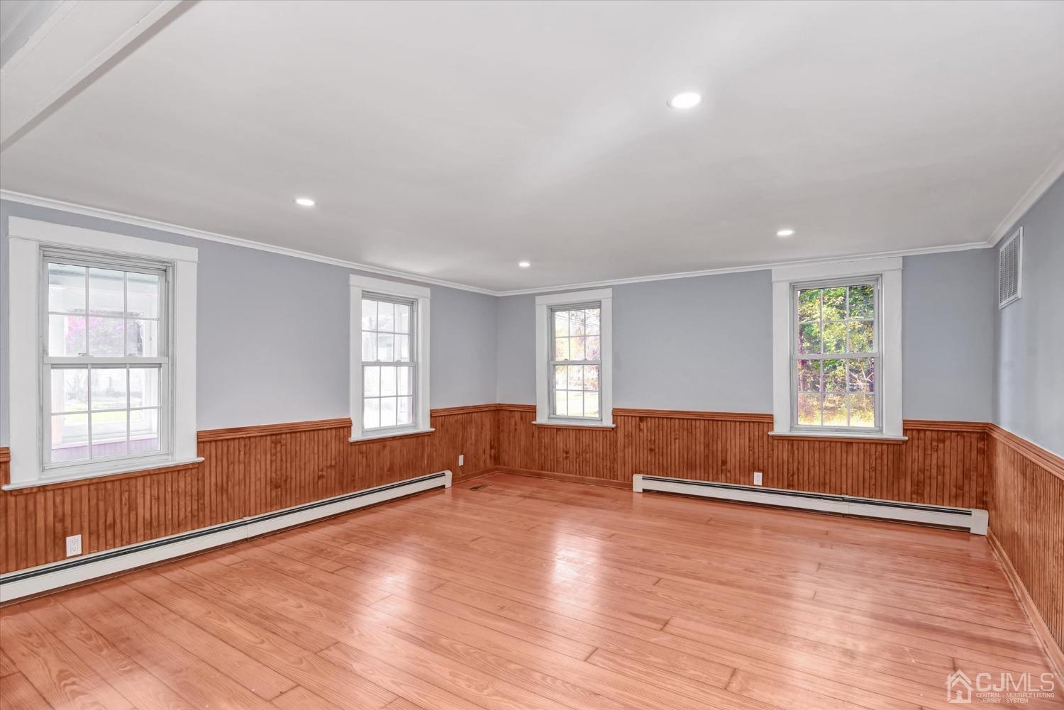 588 Adelphia Road Freehold, NJ 07728 - Photo 6 of 67 a living room with furniture and windows