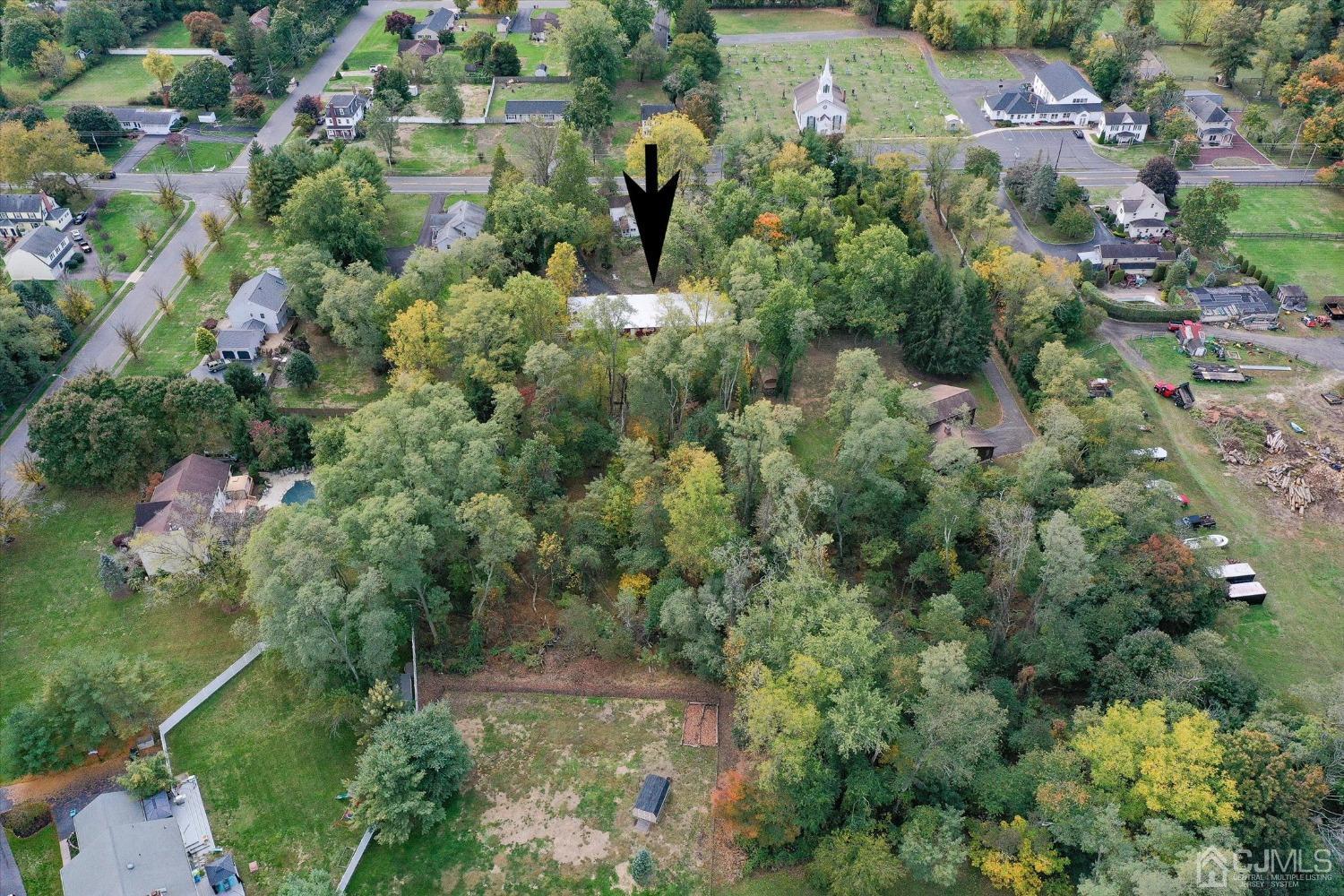 588 Adelphia Road Freehold, NJ 07728 - Photo 61 of 67 an aerial view of residential house with outdoor space and trees all around