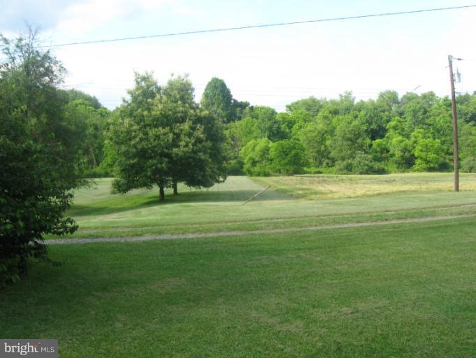24 Houck Road Westminster, MD 21157 - Photo 14 of 14 a big yard with lots of green space