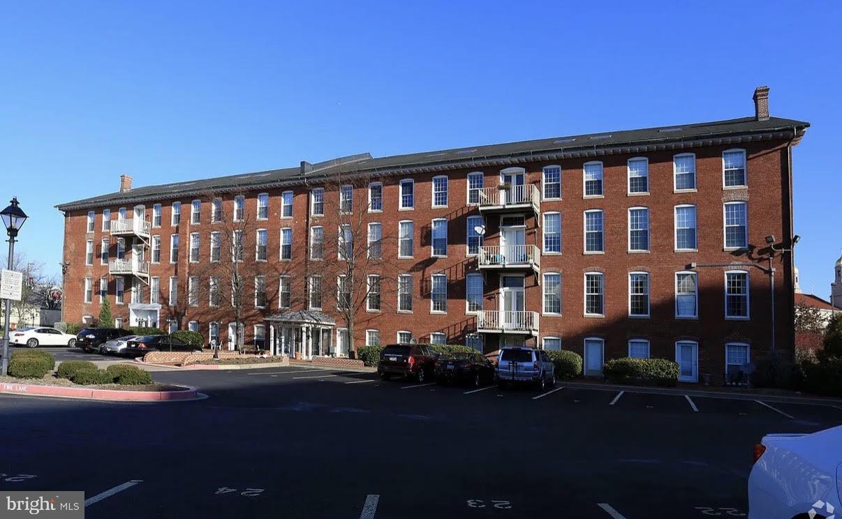 2639 Boston Street, Unit 104 Baltimore, MD 21224 - Photo 2 of 25 a city view from a balcony