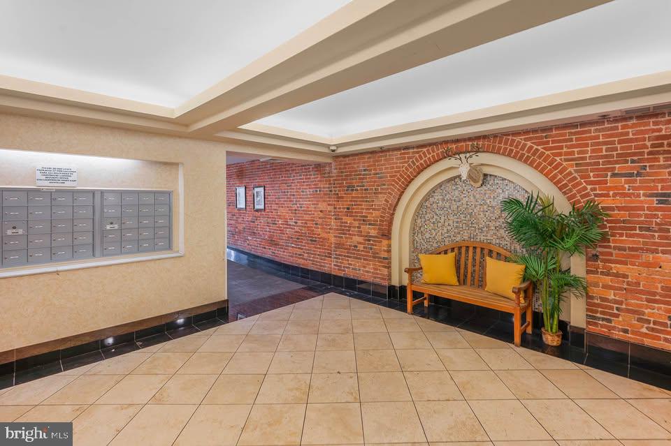 2639 Boston Street, Unit 104 Baltimore, MD 21224 - Photo 25 of 25 a view of entryway with a couch