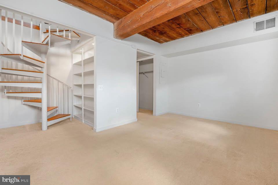 2639 Boston Street, Unit 104 Baltimore, MD 21224 - Photo 10 of 25 a view of an empty room with white walls