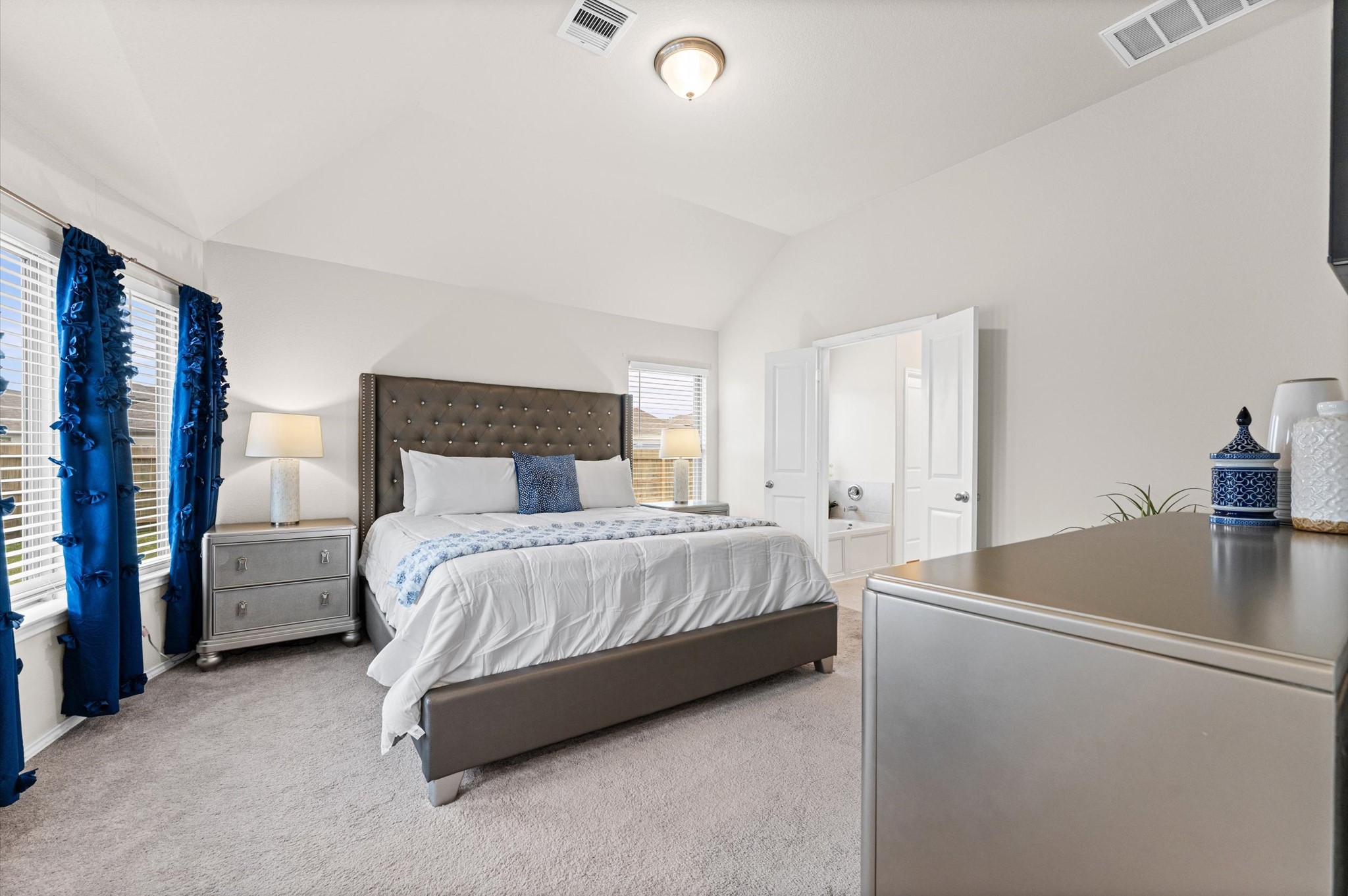 2702 Meadow View Lane Conroe, TX 77385 - Photo 9 of 26 a bed room with a bed and a couch