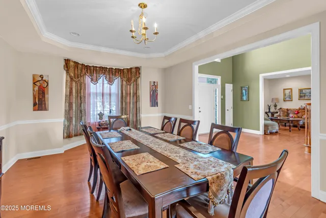 a view of a dining room with furniture