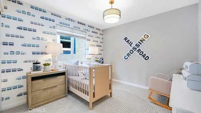 a bathroom with a sink a mirror and a shower