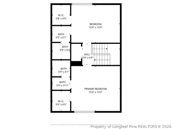 a picture of a bench in front of a wall