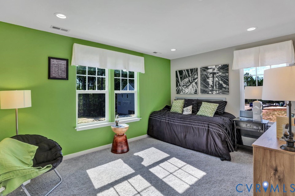 985 Charlemagne Road Midlothian, VA 23114 - Photo 27 of 42 a bedroom with a bed and a window