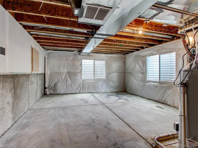 a view of back yard of a house