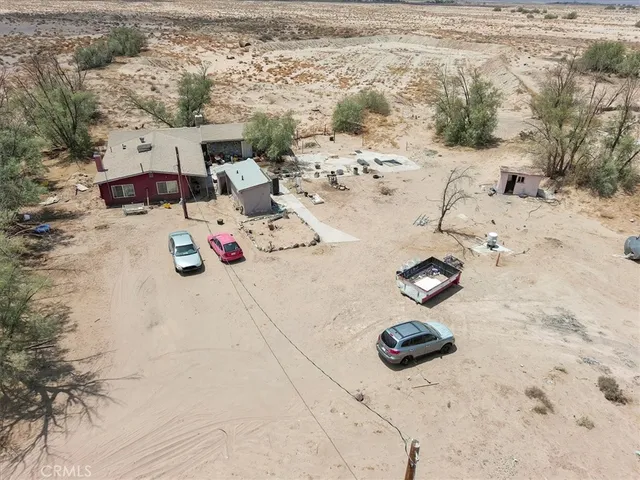 a view of beach and yard