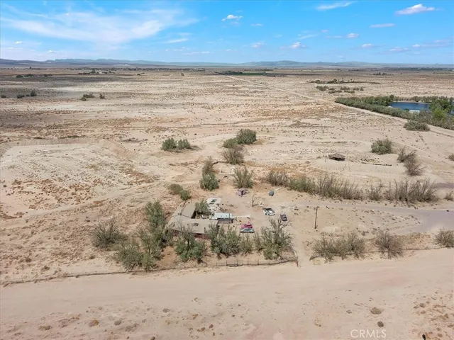 a view of kitchen with furniture and window