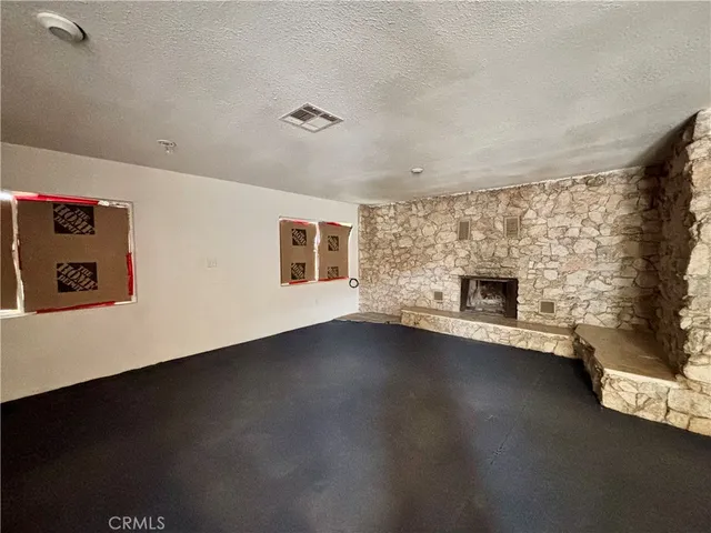 a view of a livingroom with furniture