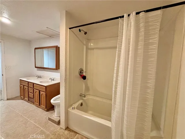 a view of a field with trees