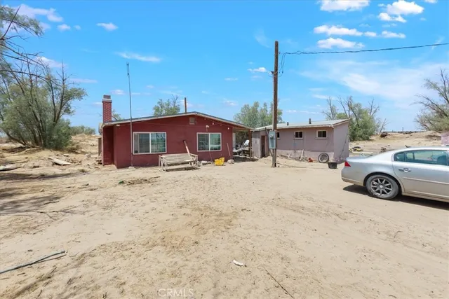 a car parked in front of a house