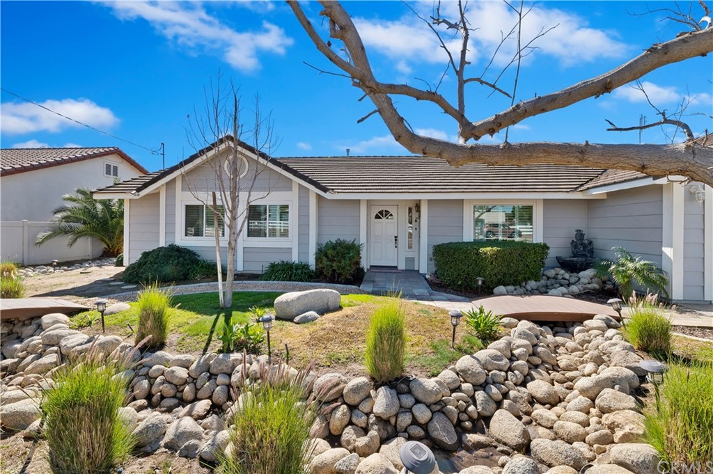 18715 Mariposa Avenue Riverside, CA 92508 - Photo 1 of 1 a view of a house with swimming pool and sitting area