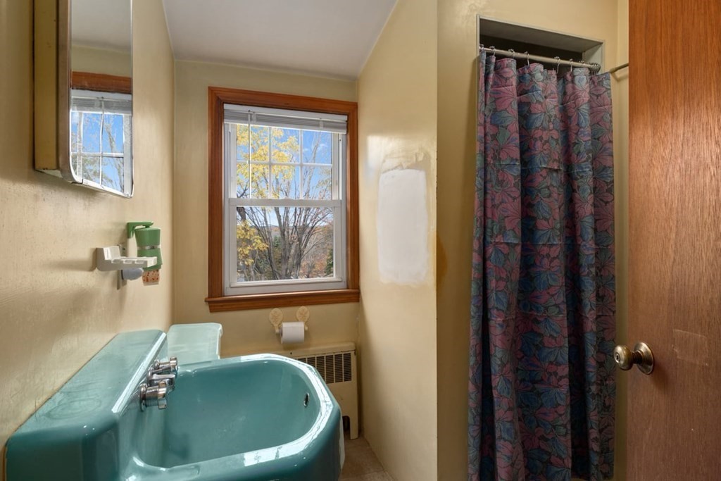 29 Irving Drive Walpole, MA 02081 - Photo 19 of 33 a bathroom with shower and bathtub