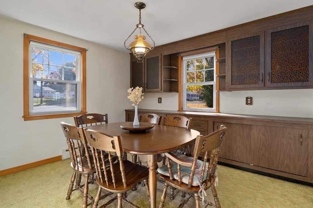 29 Irving Drive Walpole, MA 02081 - Photo 7 of 33 a dining room with furniture and window