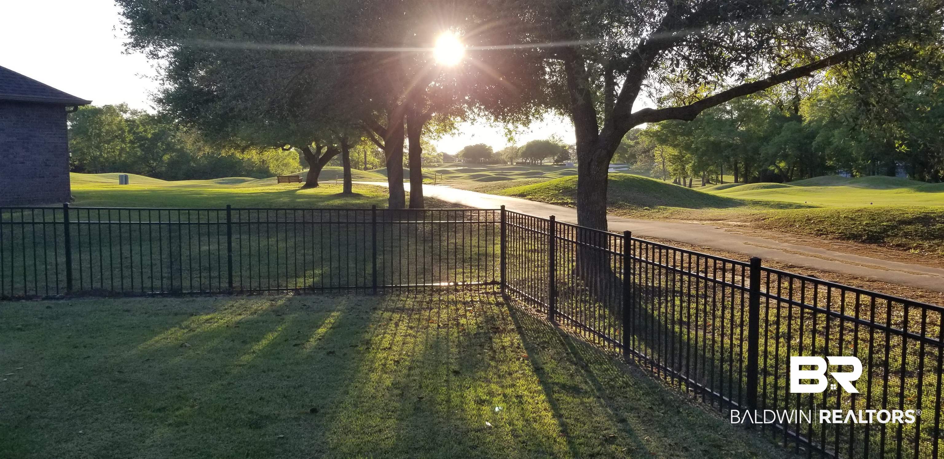 23373 Dundee Circle Foley, AL 36535 - Photo 31 of 34 Sunset from fenced back yard