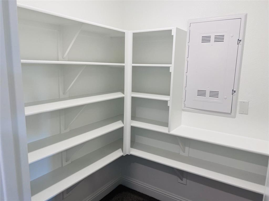 6825 Entwistle Road Frisco, TX 75034 - Photo 27 of 33 a view of an empty walk in closet