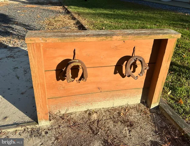 a close view of sink gate with wooden floor