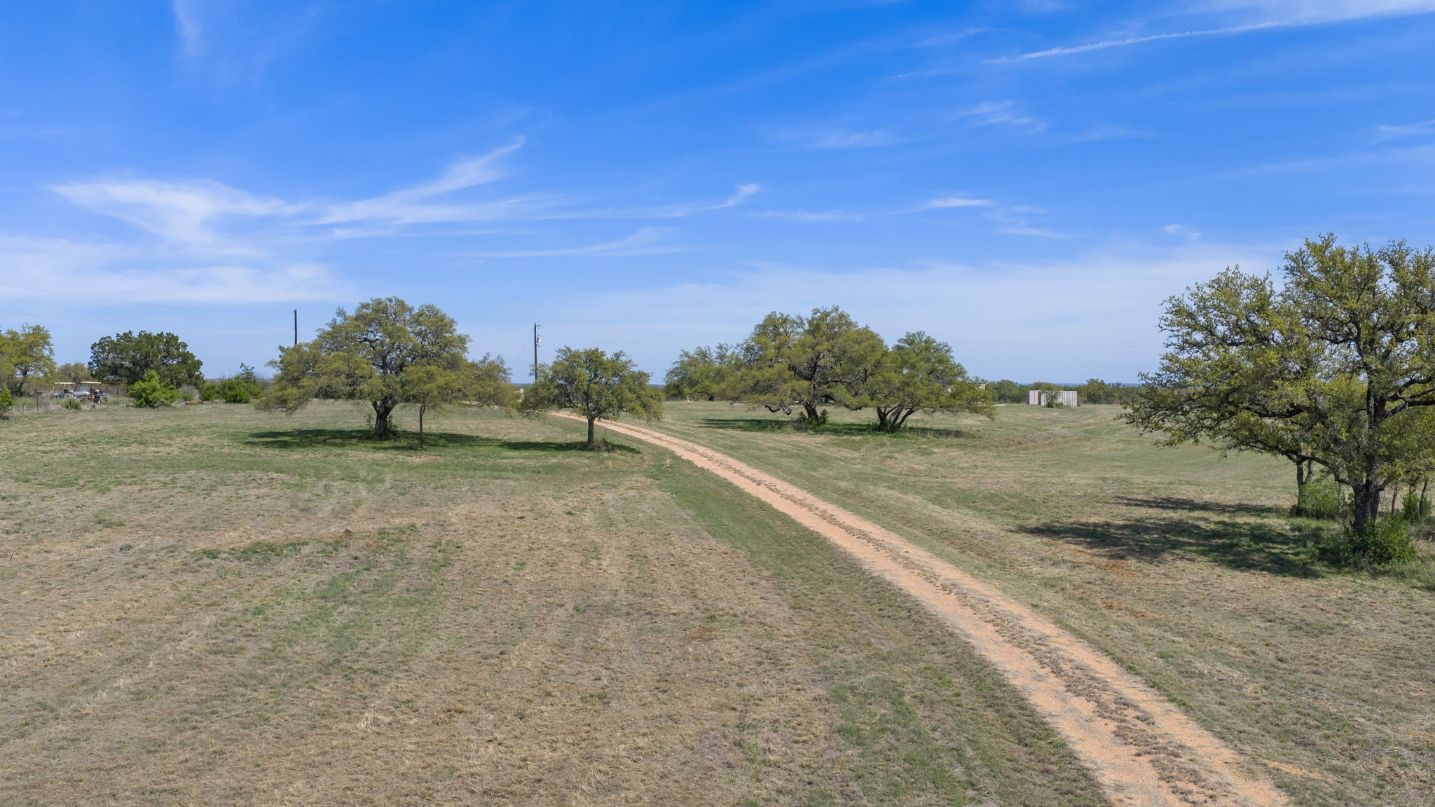 2502 Ranch Road 1323 Johnson City, TX 78636 - Photo 13 of 40 a view of a field with trees in background