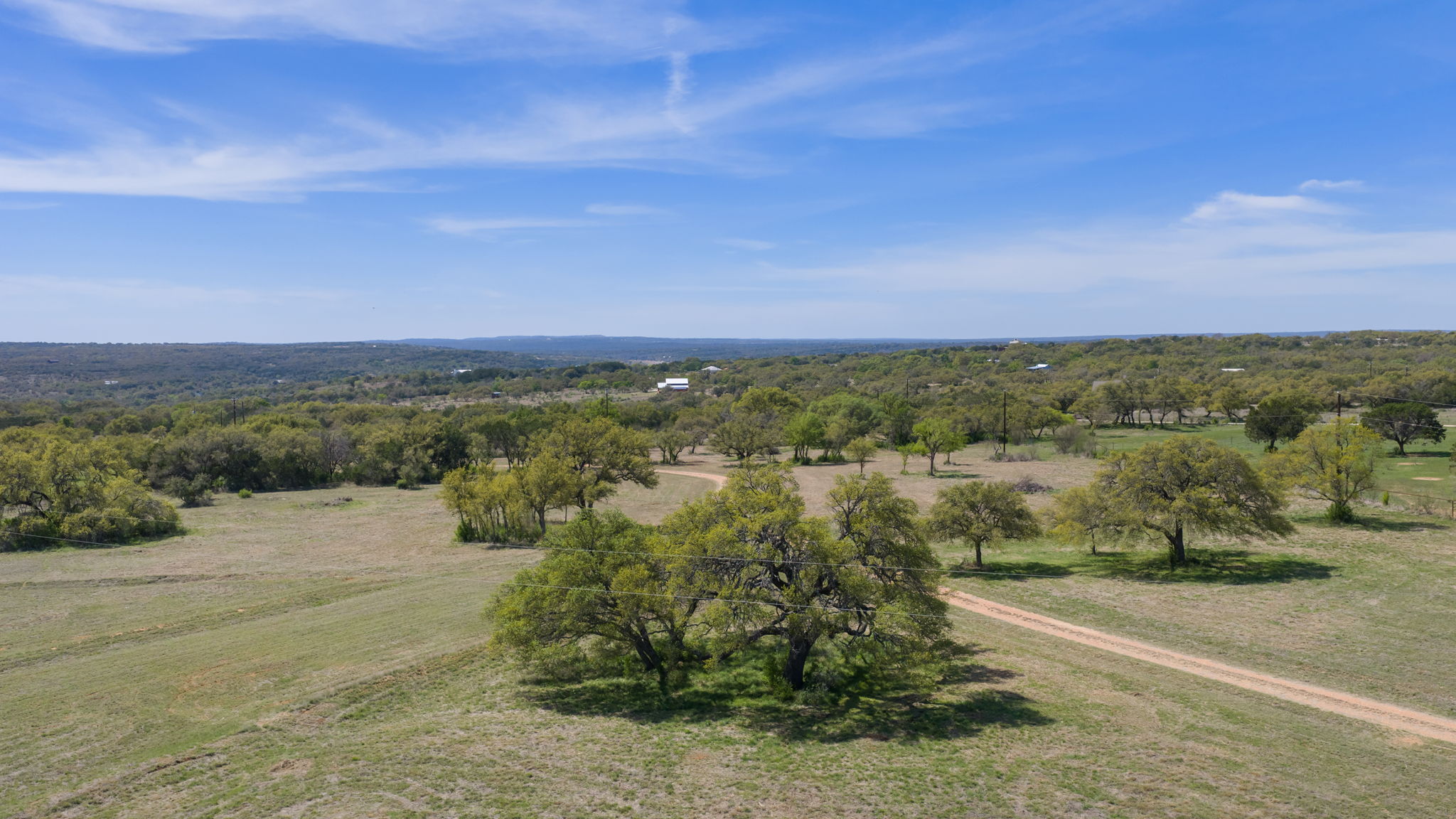 2502 Ranch Road 1323 Johnson City, TX 78636 - Photo 21 of 40 a view of a city street with a yard