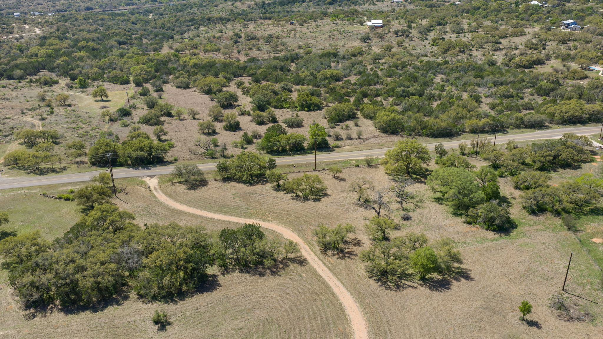 2502 Ranch Road 1323 Johnson City, TX 78636 - Photo 33 of 40 a view of a forest with a yard