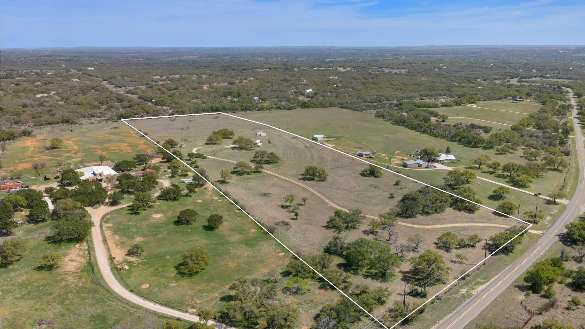 2502 Ranch Road 1323 Johnson City, TX 78636 - Photo 7 of 40 an aerial view of residential houses with outdoor space