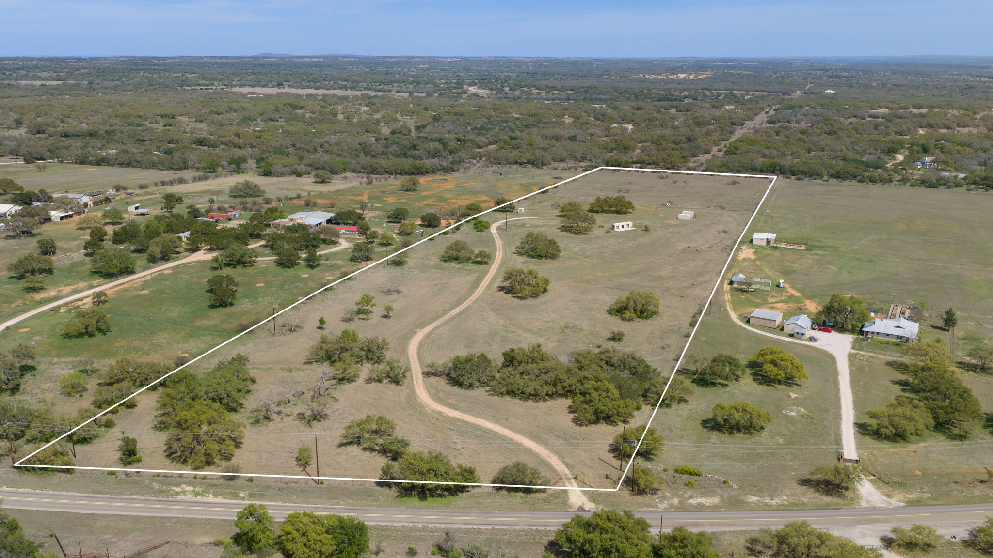 2502 Ranch Road 1323 Johnson City, TX 78636 - Photo 9 of 40 an aerial view of residential houses with outdoor space