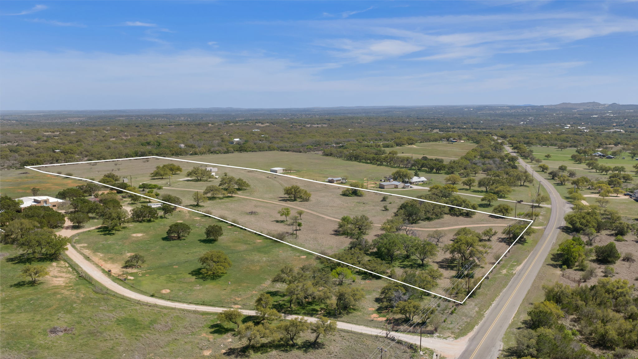 2502 Ranch Road 1323 Johnson City, TX 78636 - Photo 10 of 40 an aerial view of residential houses with outdoor space