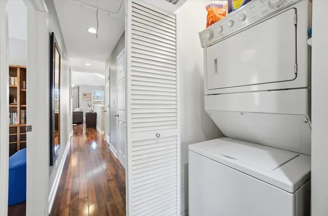 a view of a balcony with outdoor seating