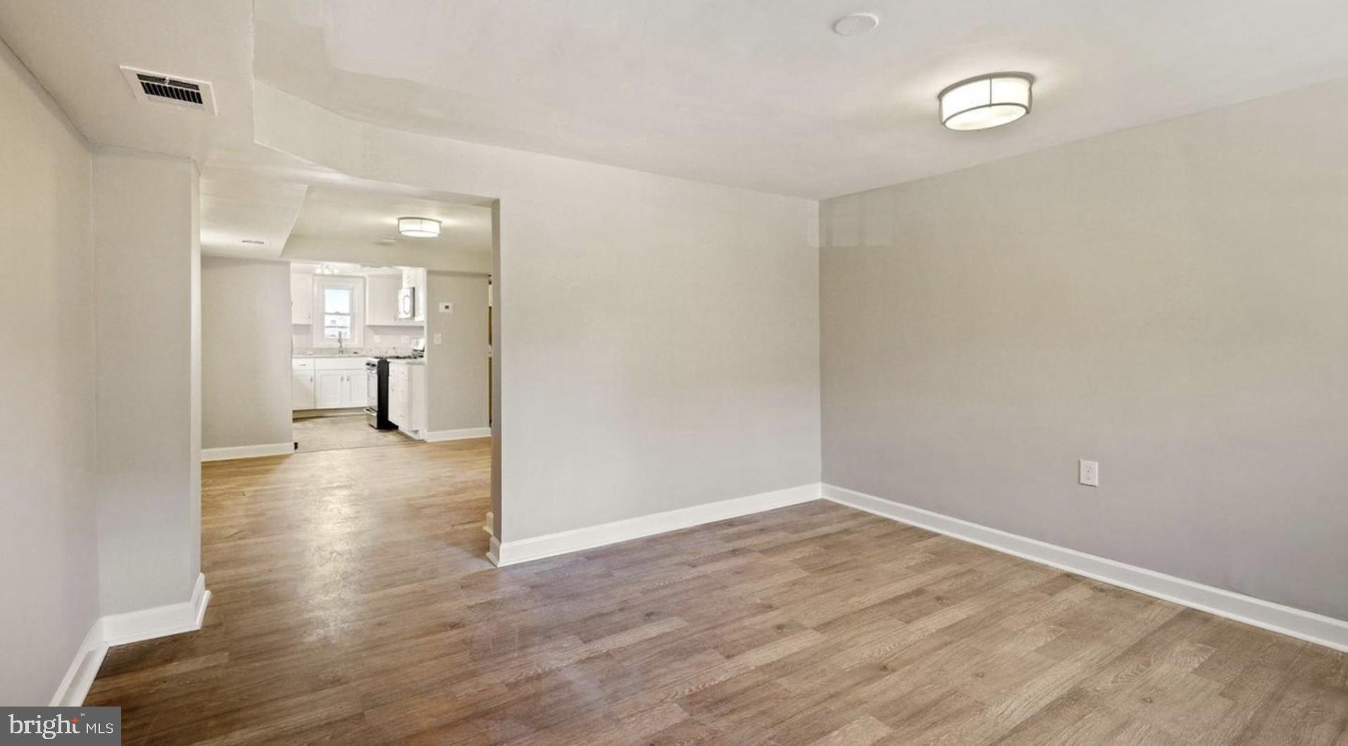 1238 U Street Southeast Washington, DC 20020 - Photo 4 of 12 Spacious, light-filled living area.