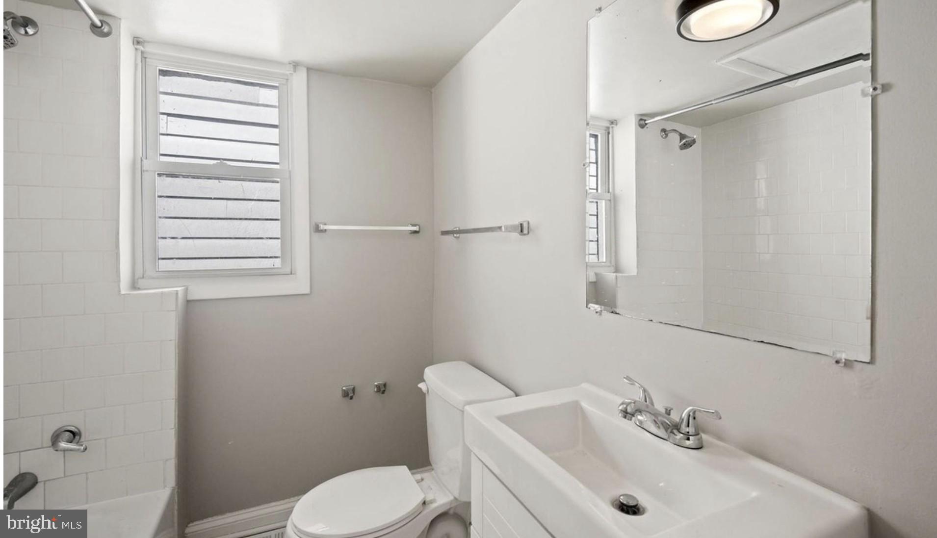 1238 U Street Southeast Washington, DC 20020 - Photo 8 of 12 Bright and airy modern bathroom space.