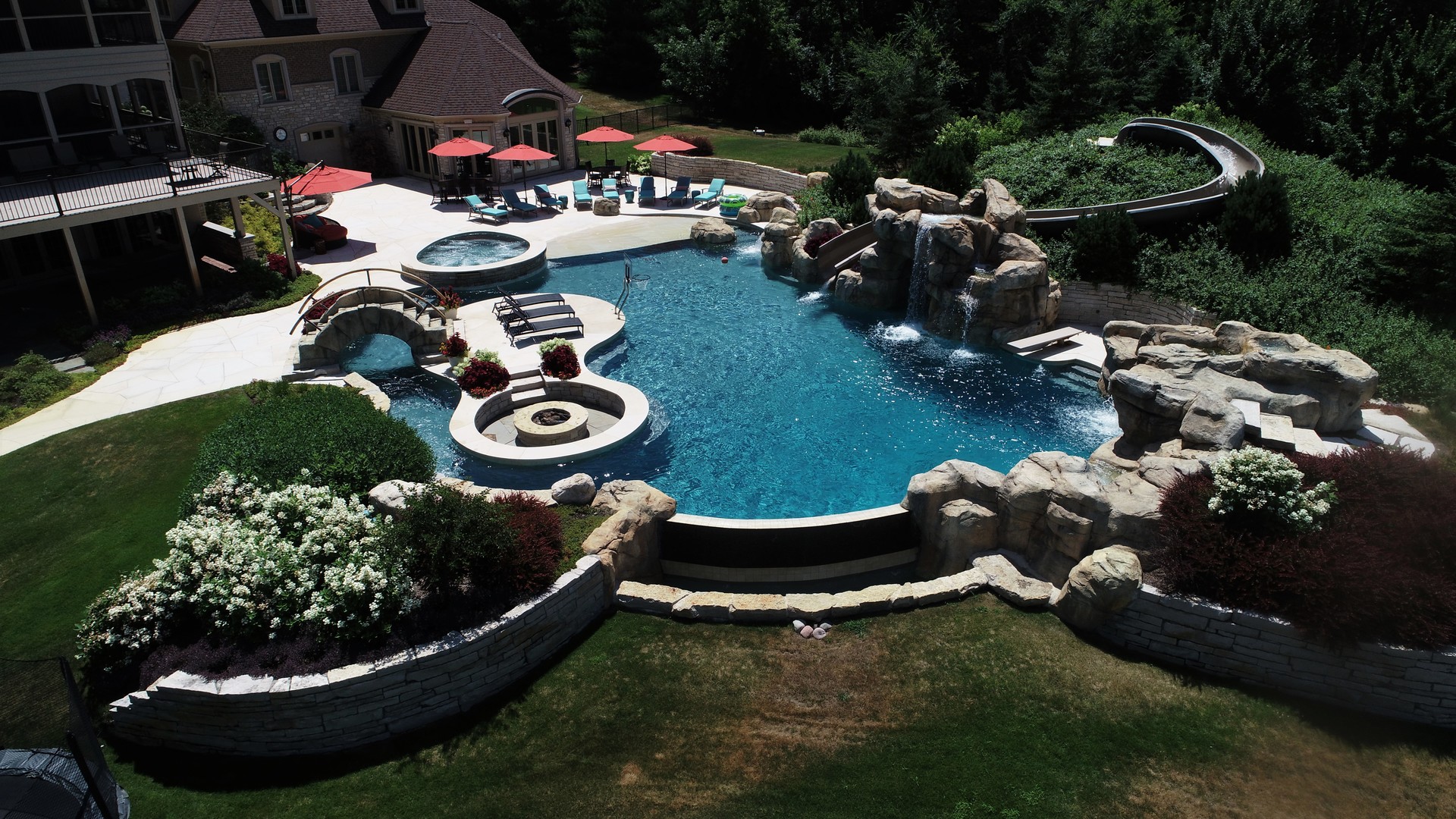 419 North Valley Hill Road Bull Valley, IL 60098 - Photo 4 of 16 a view of a backyard with plants and chairs