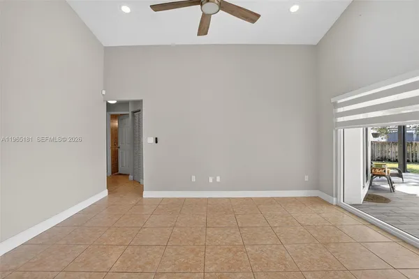 a view of an empty room and window