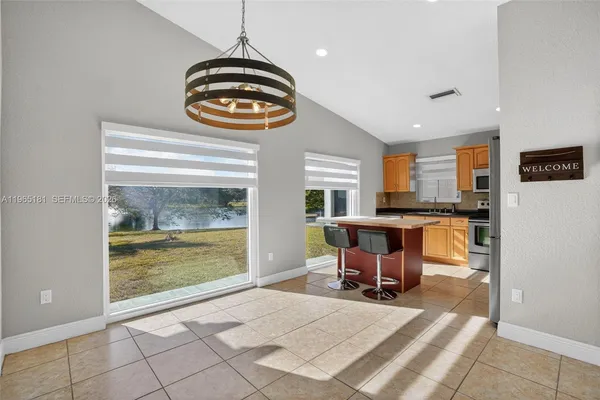a view of a livingroom with furniture and window