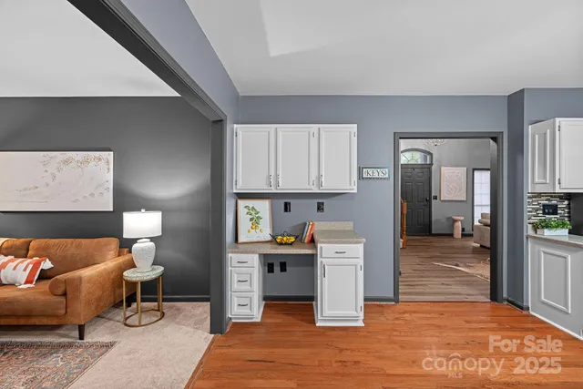 a bedroom with a bed and a lamp on table