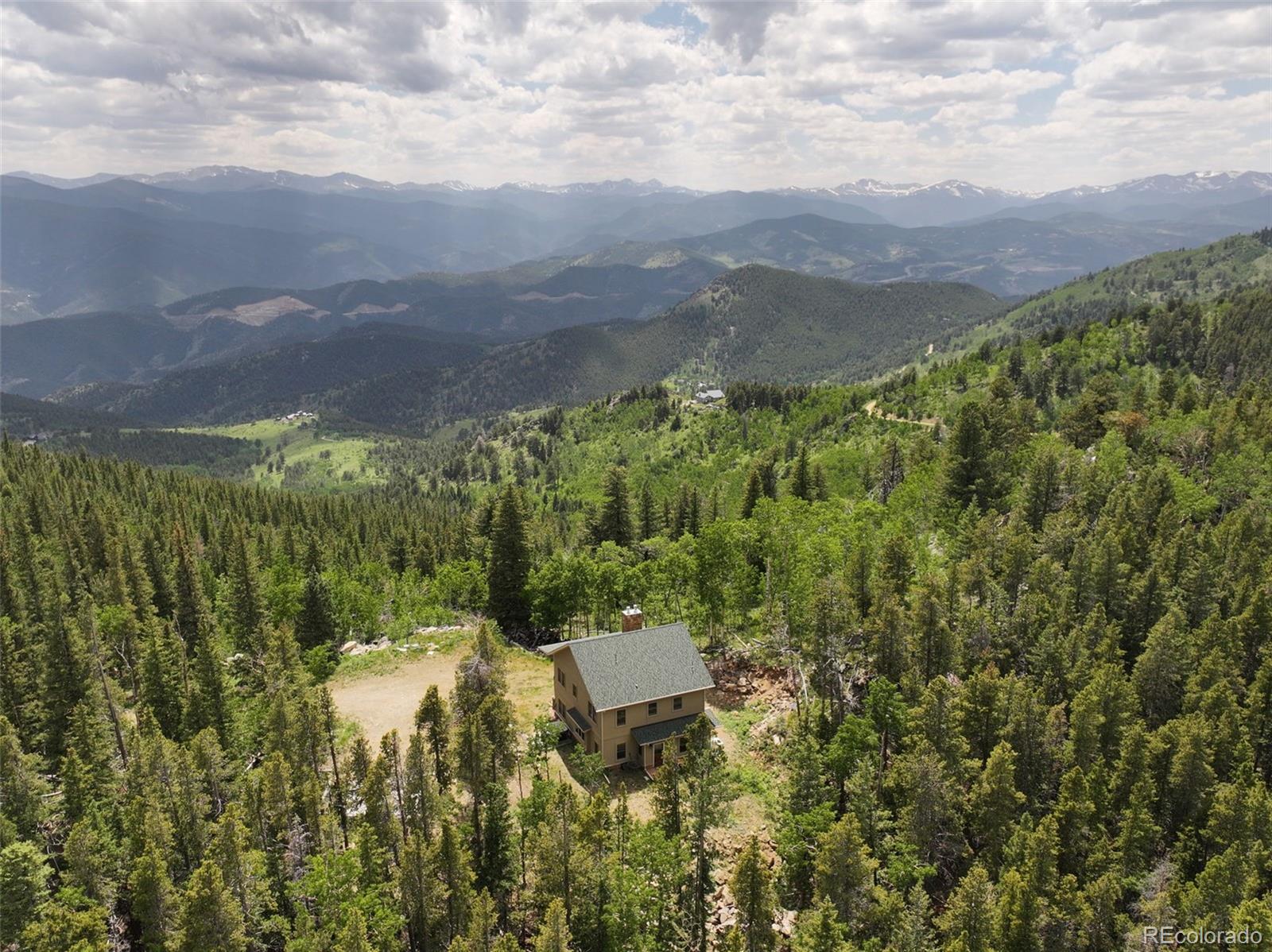1555 Three Peaks Road Black Hawk, CO 80422 - Photo 13 of 50 a view of a yard
