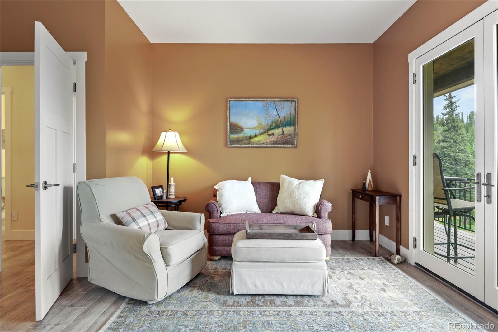 1555 Three Peaks Road Black Hawk, CO 80422 - Photo 41 of 50 a living room with furniture and a window