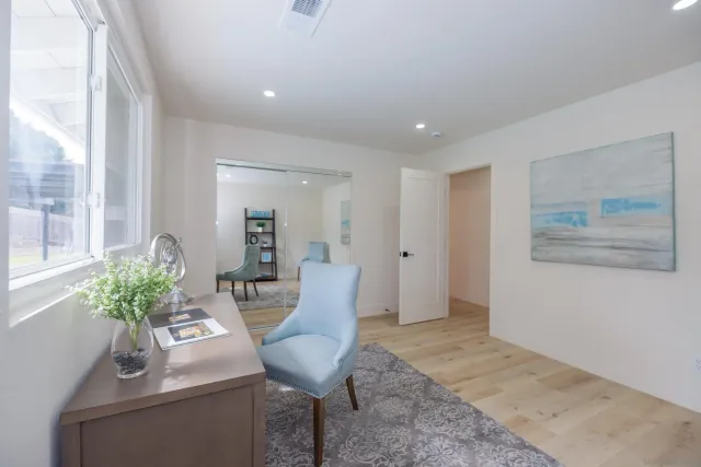 a view of a swimming pool with a patio