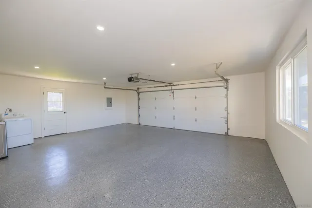 a view of a swimming pool in the backyard